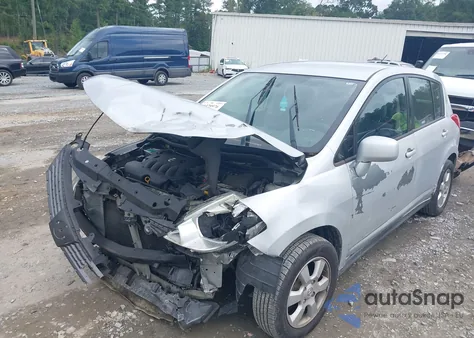 2009 Nissan Versa 1.8Sl z USA, uszkodzony, nr VIN 3N1BC13E49L374126